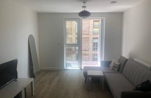 Royal Docks House | Luxury Double Room featuring comfortable sofa bed to sleep on, private balcony, and exclusive access to rooftop and garden in welcoming shared flat with host