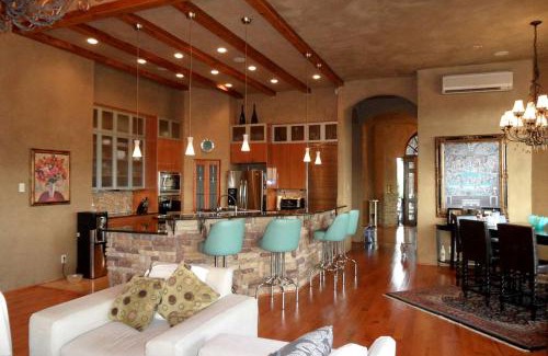 New Braunfels House | Luxury Four-Bedroom Cabin Rental with a Fireplace in New Braunfels, Texas