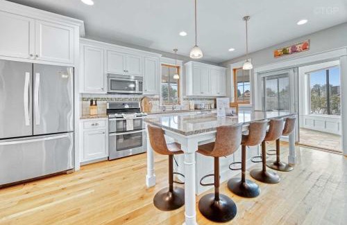 South Haven House | Luxury Home with Harbor Views Hot Tub Walk to North Beach Dog Friendly