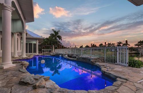 Pelican House | Luxury Resort-Style Saltwater Pool Home in SW Cape Coral