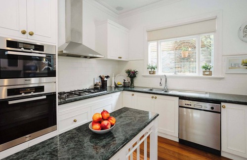 Montmorency House | Luxury Retreat: Pool, Fireplace & Parking