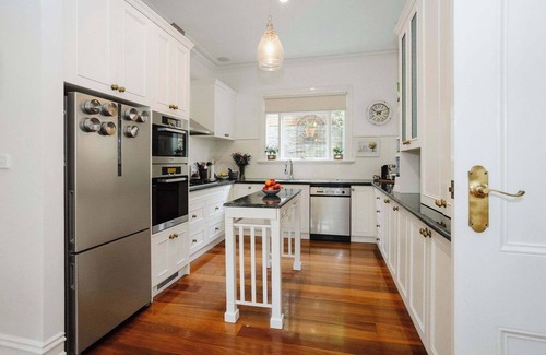 Montmorency House | Luxury Retreat: Pool, Fireplace & Parking