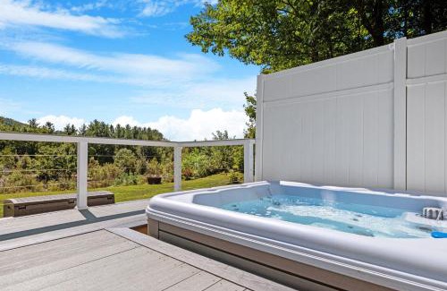 North Woodstock House | Luxury Riverfront Retreat Hot Tub, Game Room, Gym