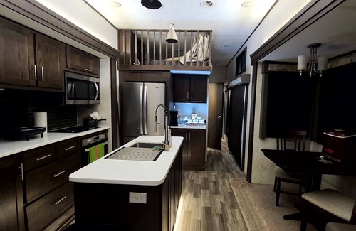 Eagle Pass House | Luxury RV with full kitchen sleeps family of 6 inside fenced property