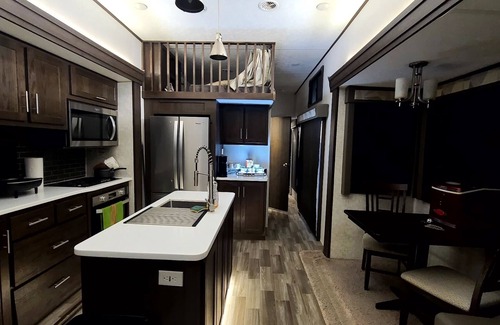 Eagle Pass House | Luxury RV with full kitchen sleeps family of 6 inside fenced property