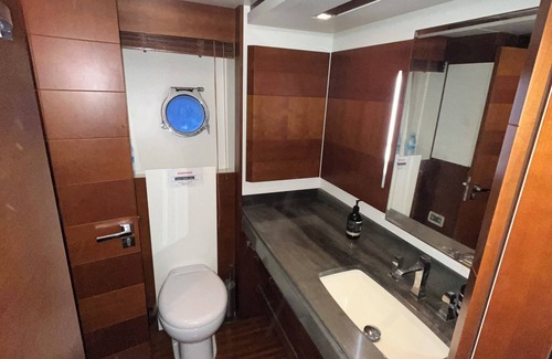 Sydney Boat Rental | Luxury Super Yacht sleeps 10 Berthed amongst restaurants and cafes.