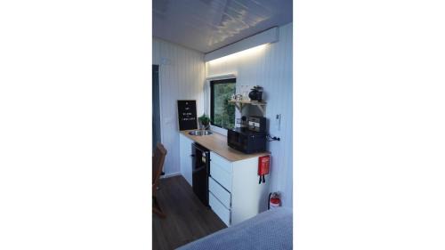 Woodstock House | Lydia's Lodge by Tiny Away