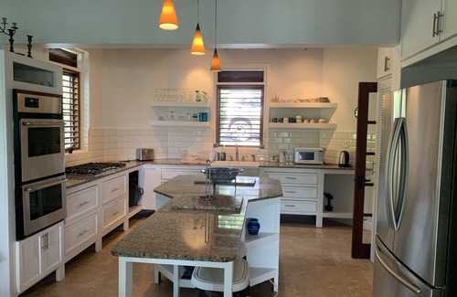 English Harbour House | Mamaku Manor, water front property with swimming pool