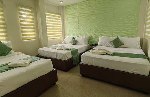 Puerto Princesa City Centre Hotel | Manuela's Suites