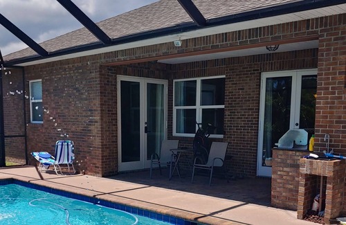 Tropic Apartment | Master bedroom suite with pool. Eight minutes to beaches.