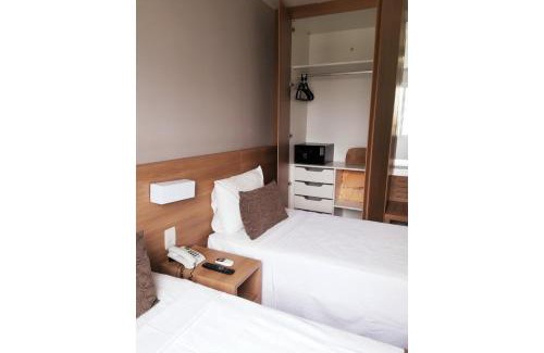 Jacarepagua Apartment | MELHOR Localização na Barra da Tijuca- Apartamento com Ar, wifi, microondas