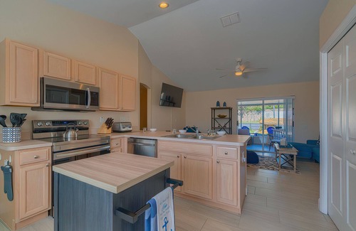Spring Hill House | Memories by the Gulf | 4BR Oasis w/Heated Saltwater Cocktail Pool & Fire Pit