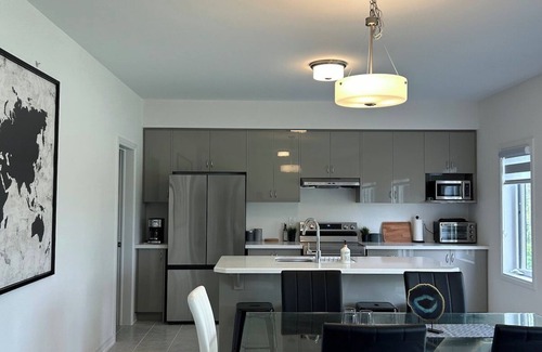Cumberland Beach House | Menoke Modern Family Home with Game Room