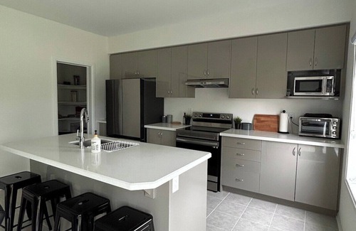 Cumberland Beach House | Menoke Modern Family Home with Game Room