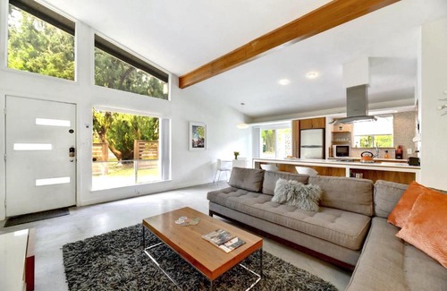 South River City House | Mid Century Modern near SoCo & DT by Lodgewell