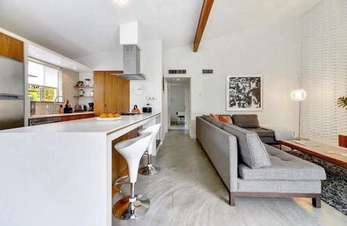 South River City House | Mid Century Modern near SoCo & DT by Lodgewell