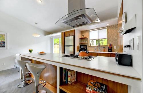 South River City House | Mid Century Modern near SoCo & DT by Lodgewell
