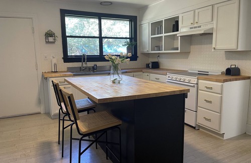 Tupelo House | Mid-Century w/large private fenced backyard! No added cleaning or pet fees!