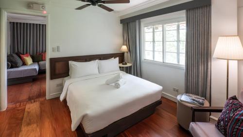 Bagong Lipunan Ng Crame Apartment | MiraNamin Nest LIRYO and LANTANA Residence in Unique Historic Home - Garden, Rooftop, Private Kitchen