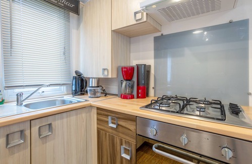 Pont-Aven RV Rental | Mobile Home 'Mobilhome 6 Pers Face Piscine' with Shared Pool and Private Terrace