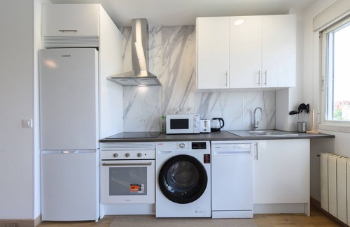 Ciudad Lineal Apartment | Modern 1-bedroom flat with large windows and sofa bed for guests in Madrid