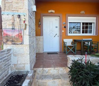 Kato Stalos Apartment | Modern 1-bedroom with BBQ & Roof Garden near Beach