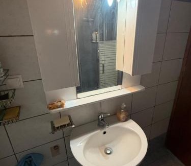 Kato Stalos Apartment | Modern 1-bedroom with BBQ & Roof Garden near Beach