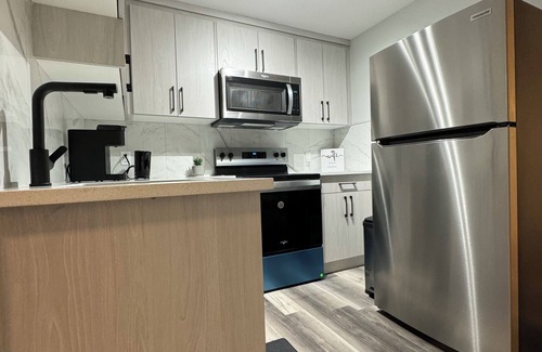 Southwest Calgary House | Modern 2-bedroom suite - Cozy vibes & Great Location.