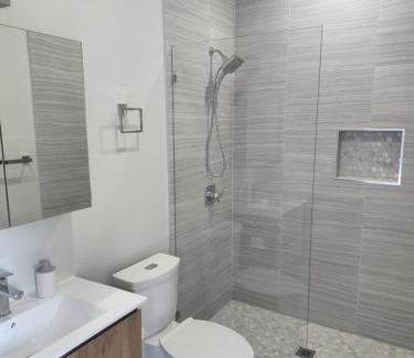 West Bay Apartment | Modern 2 bedroom walking distance to the beach!