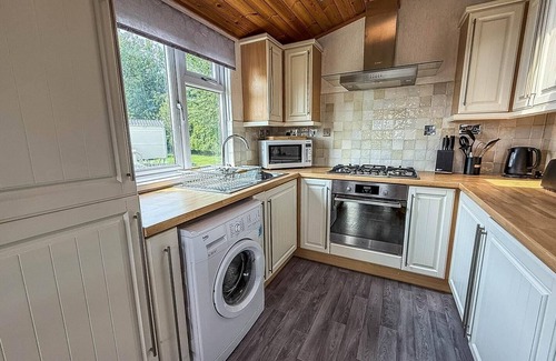Hunstanton Cabin | Modern 4 berth lodge with decking at Manor Park in Hunstanton ref 23024W