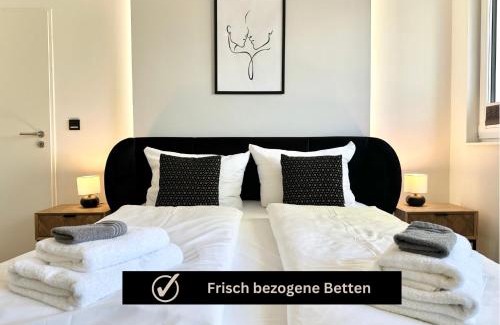 Rauental Apartment | Modern Apartment - für Freunde & Familien, stadtnah, Parkplatz, E-Ladestation, Gitterbox für Fahrräder, Fitnessstudio, digitale Gästemappe mit Restaurant- und Unternehmenstipps