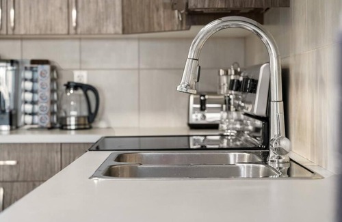 Sage Hill Apartment | Modern Basement Gem: 2 BR Retreat