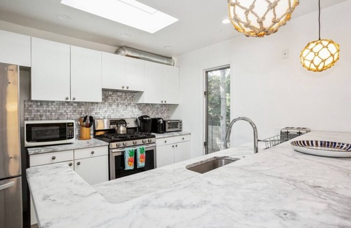 Clearwater Beach House | Modern Beach Bungalow with Heated Pool, Walk to Bay, Pet Friendly