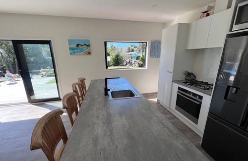 Whiritoa House | Modern beach house, short walk from the beach.