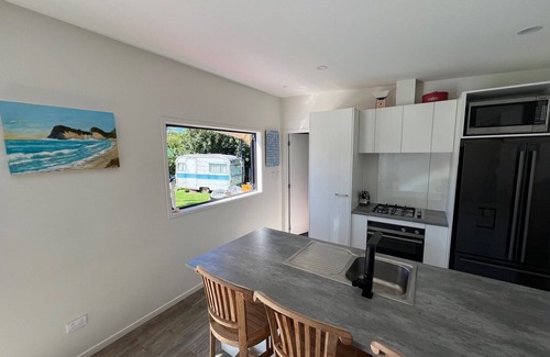 Whiritoa House | Modern beach house, short walk from the beach.