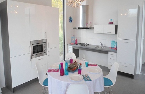 Municipality of Langedijk Ski Chalet | Modern chalet with a fireplace in a holiday park