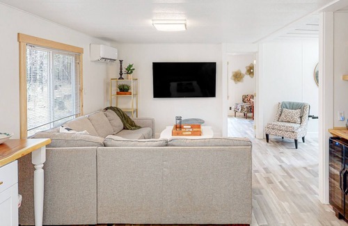 Blue River Cabin | Modern dog-friendly cabin with private deck, foosball, grill, AC, & W/D