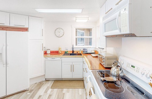 Blue River Cabin | Modern dog-friendly cabin with private deck, foosball, grill, AC, & W/D