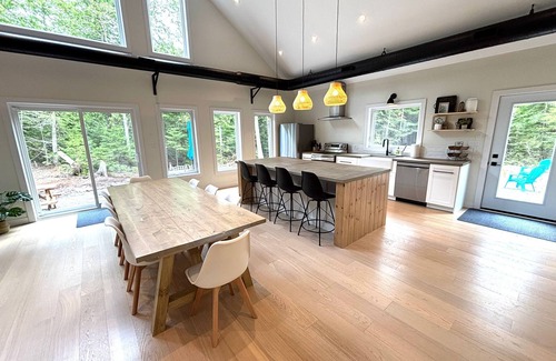 Lion's Head House | Modern forest retreat in Stokes Bay! Featuring king beds, cozy bunk rooms, a spacious game loft, firepit, chef’s kitchen, and open-concept living. Perfect for families and groups—close to Bruce Peninsula hiking, beaches, and dark sky stargazing.