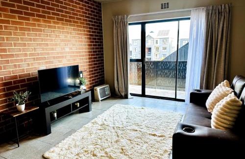 Greater Johannesburg Metropolitan Area Apartment | Modern Gem Near Mall of Africa!