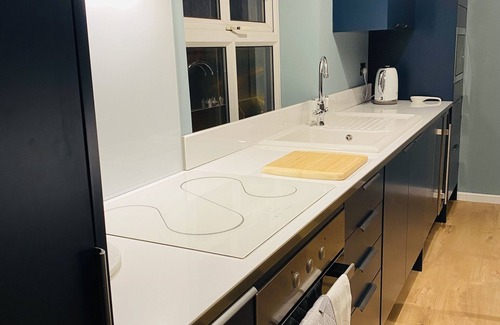 Forsbrook Apartment | Modern Holiday Flat above Cosy Village pub & Restaurant