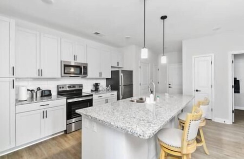 Charlotte Apartment | Modern Living by PNC Pavilion, UNC, Bars, and Grocery Store