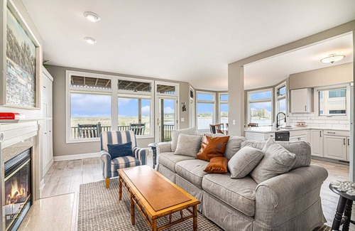 Manistee Condo | Modern Main Floor Waterfront Condo