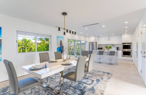 Imperial Point House | Modern Oasis, Heated Pool, Short Drive to Beach