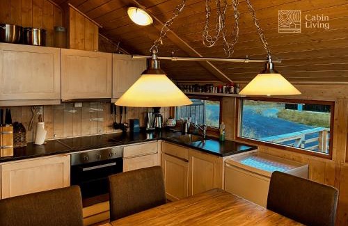 Ringsaker House | Modern sports cabin on Sjusjøen with sauna and waxing room
