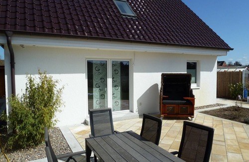 Ratekau House | Modern vacation home -fireplace-sauna-wellness-nature-Baltic Sea-quiet-3 bedrooms
