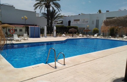 Puerto Rey Apartment | Modern VeraPlaya Apartment: Wifi + Pool + Garden
