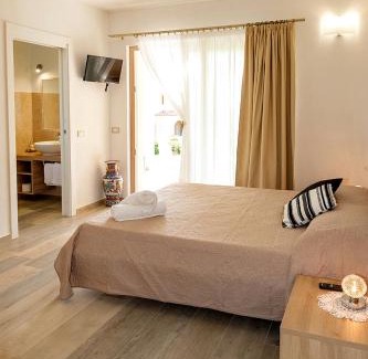 San Teodoro Apartment | MOLAROTTO CAMERE CON ANGOLO COTTURA