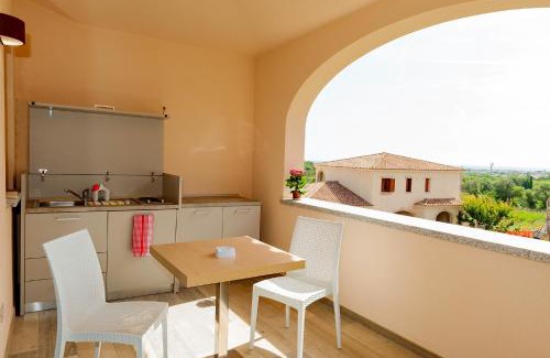San Teodoro Apartment | MOLAROTTO CAMERE CON ANGOLO COTTURA