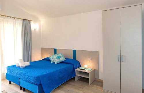 San Teodoro Apartment | MOLAROTTO CAMERE CON ANGOLO COTTURA